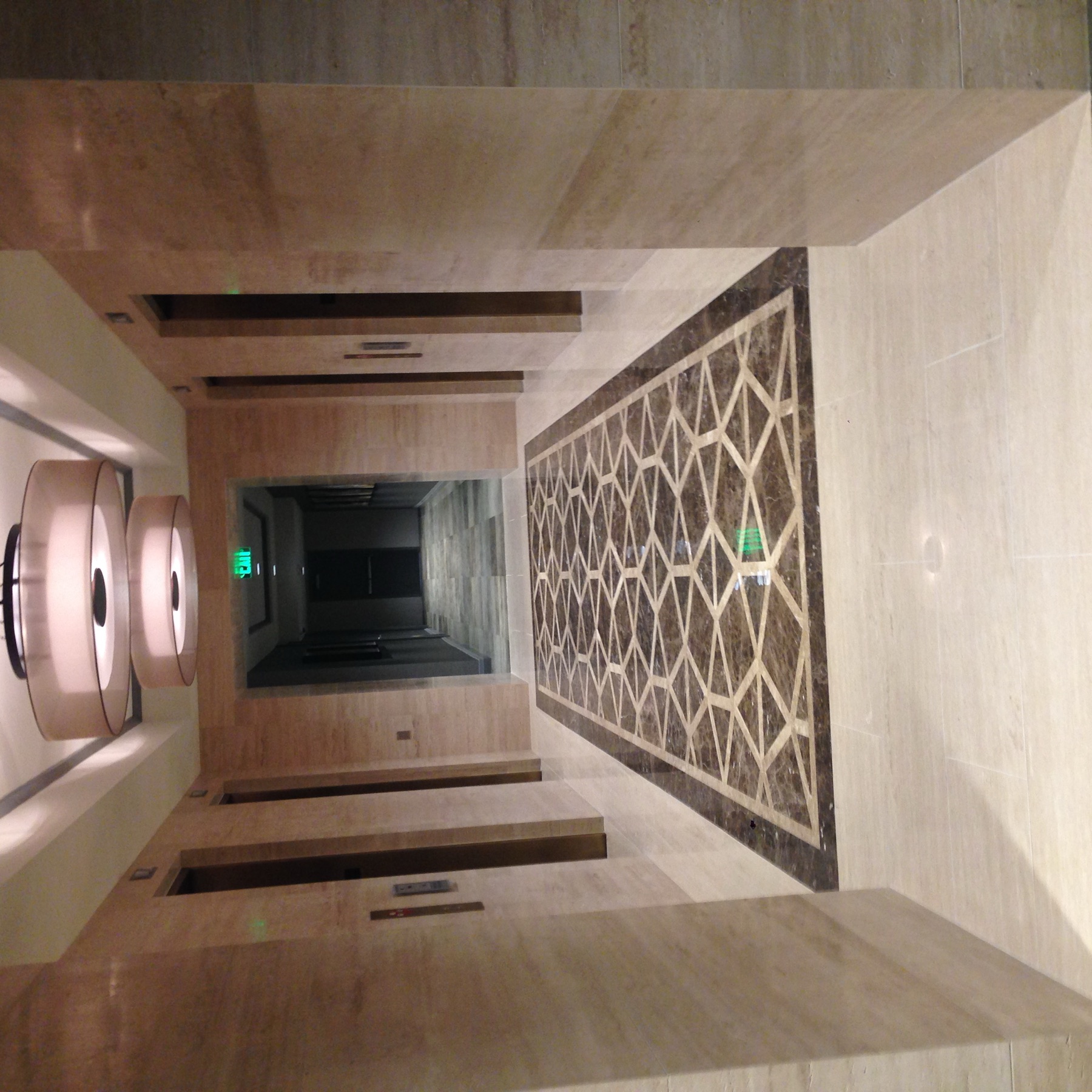 Finished stone lobby floor installed by Cangelosi Company