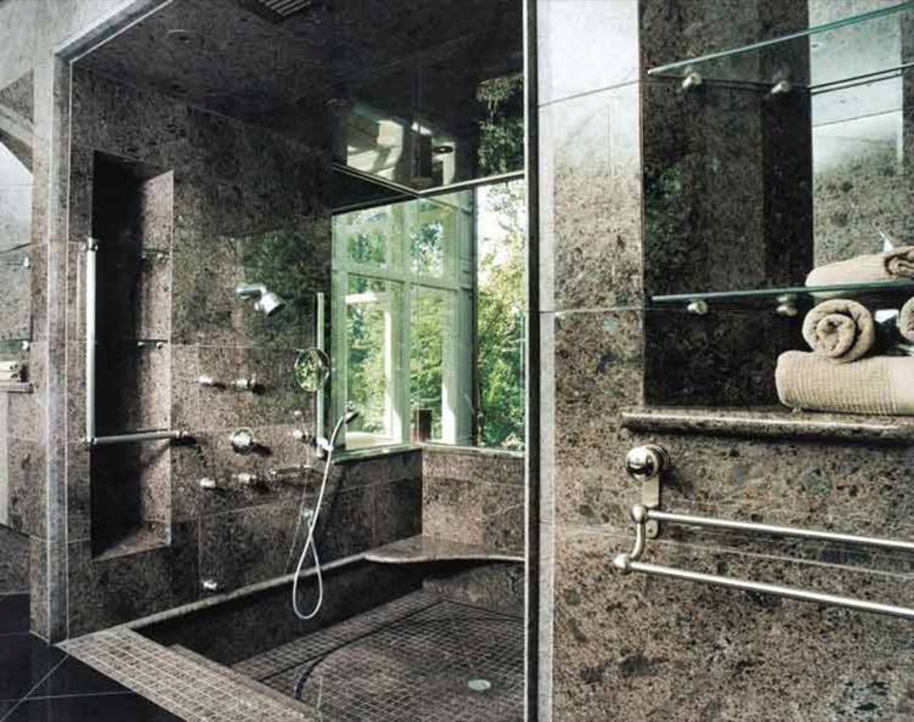 Custom marble slab shower fabricated by Cangelosi Company